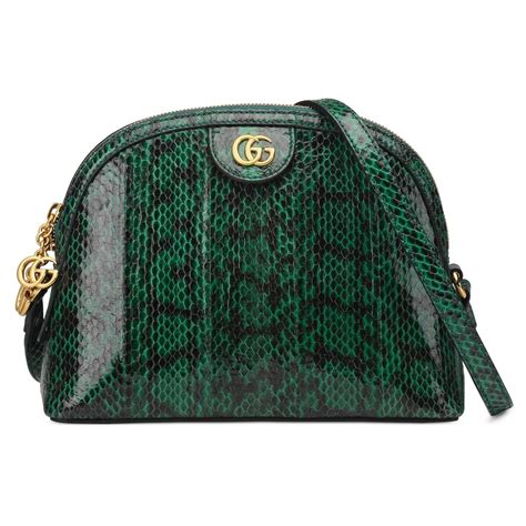 green gucci bag with snake.